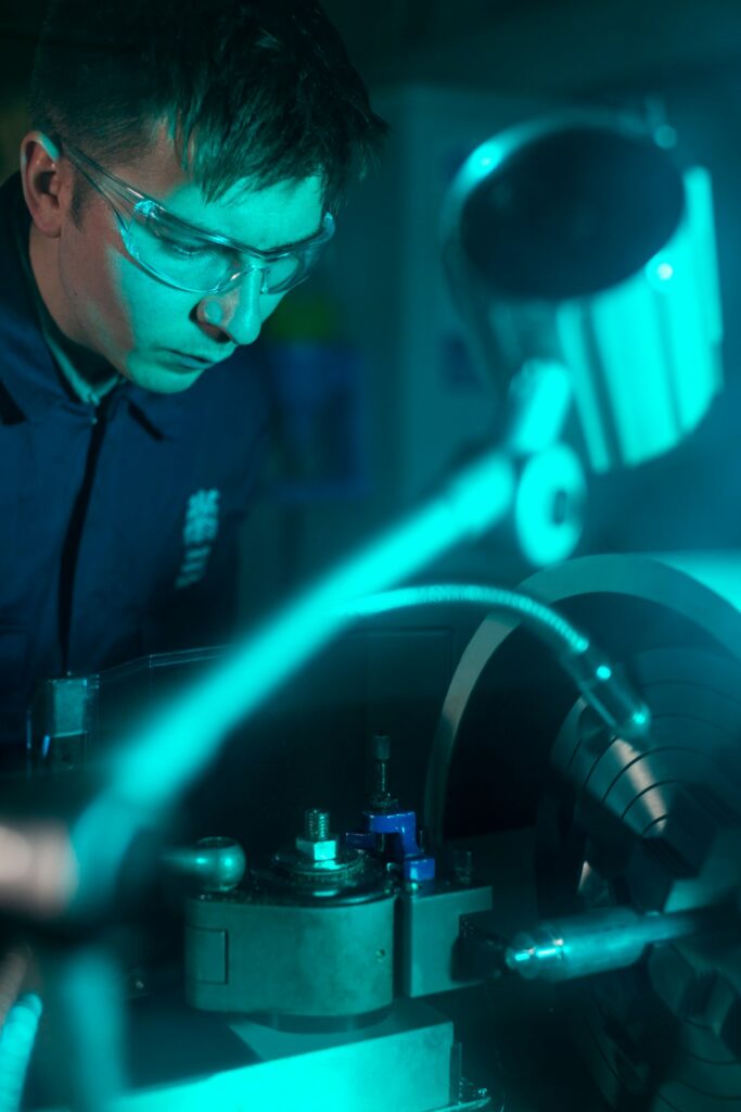 Mechanical engineer working on industrial equipment